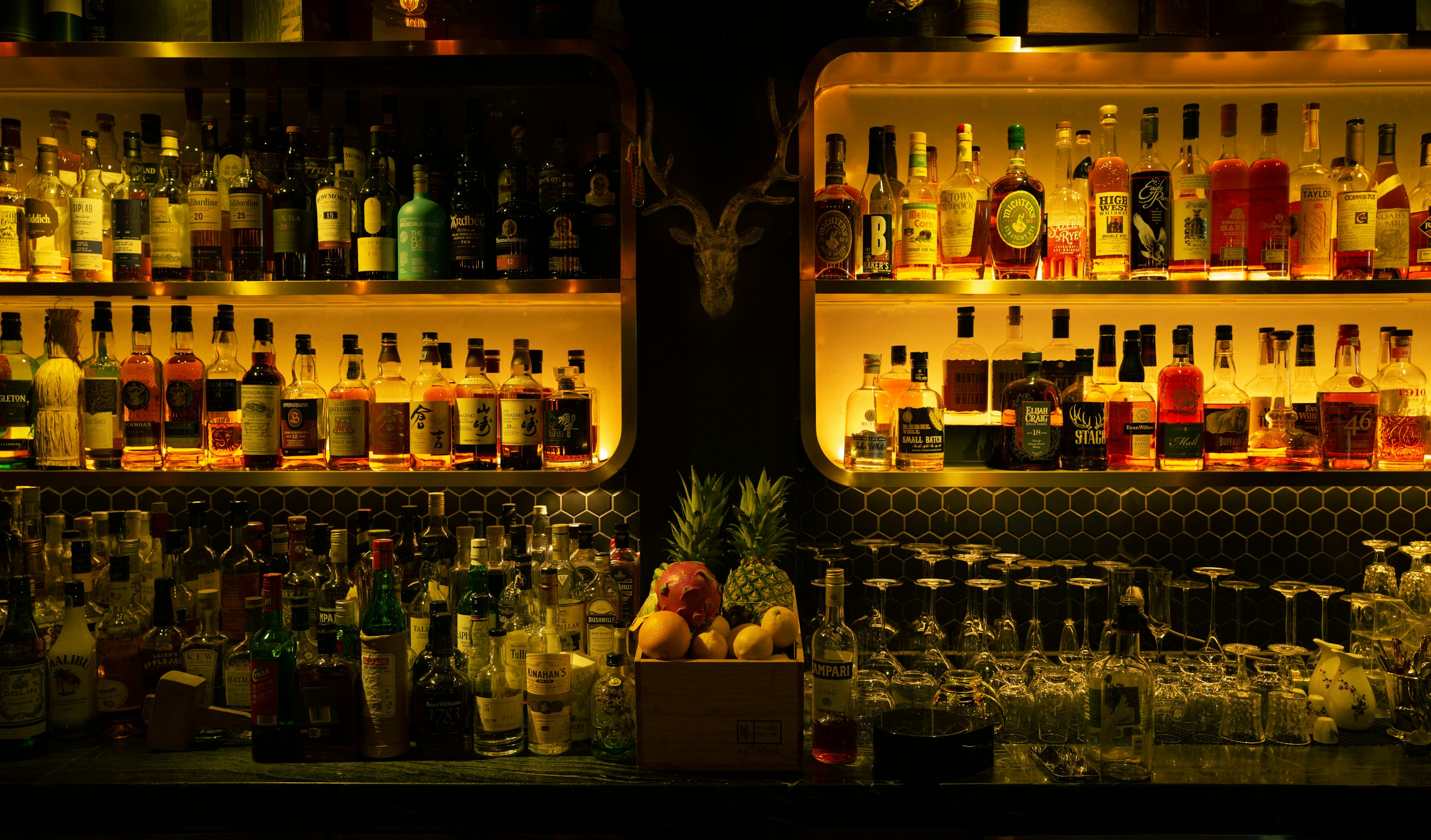 Back bar bottles and warm lighting